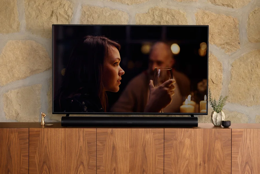 TV and Sonos soundbar on a timber cabinet in a home living space